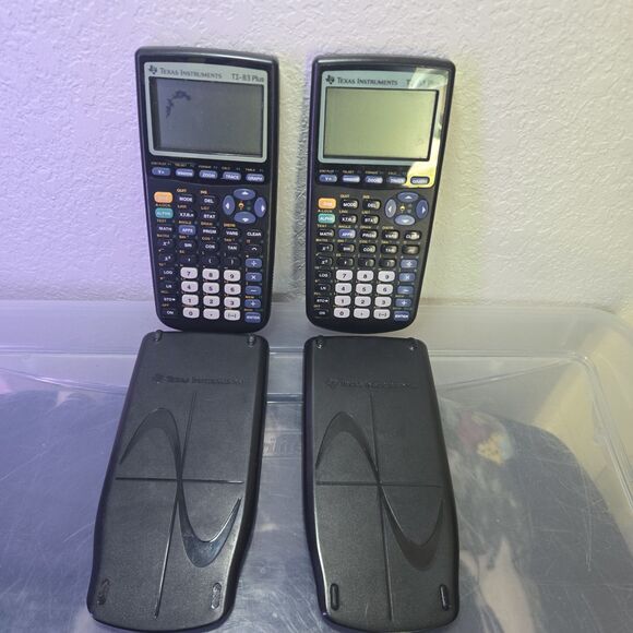 Lot 2 Texas Instruments TI-83 Plus Graphing Calculators w/ Covers – For Parts - Picture 1 of 4